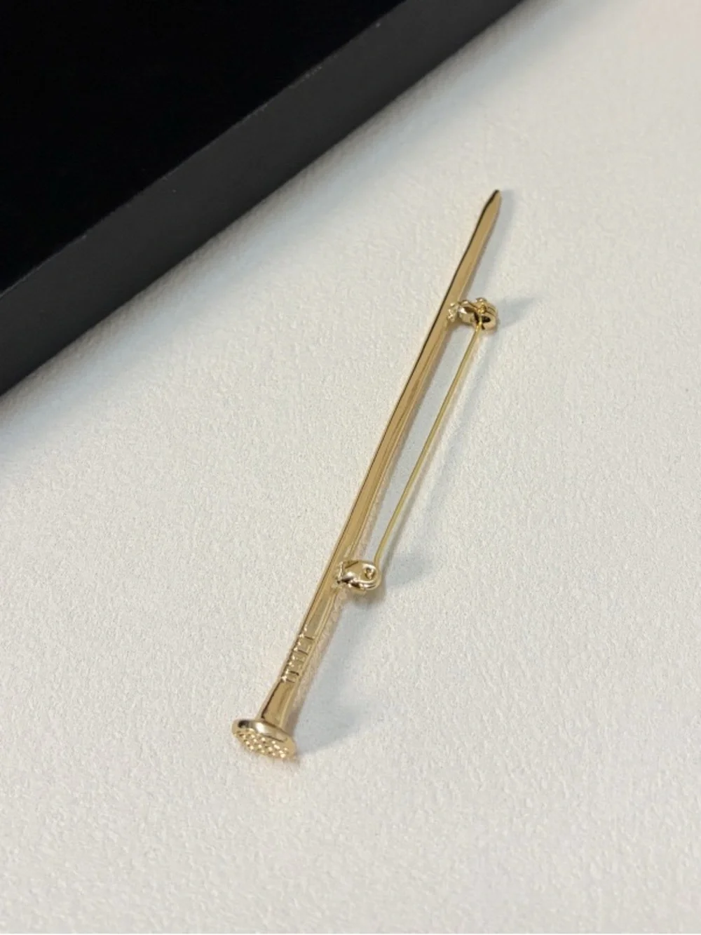 Anthropologie Gold Nail-Shape Brooch Pin